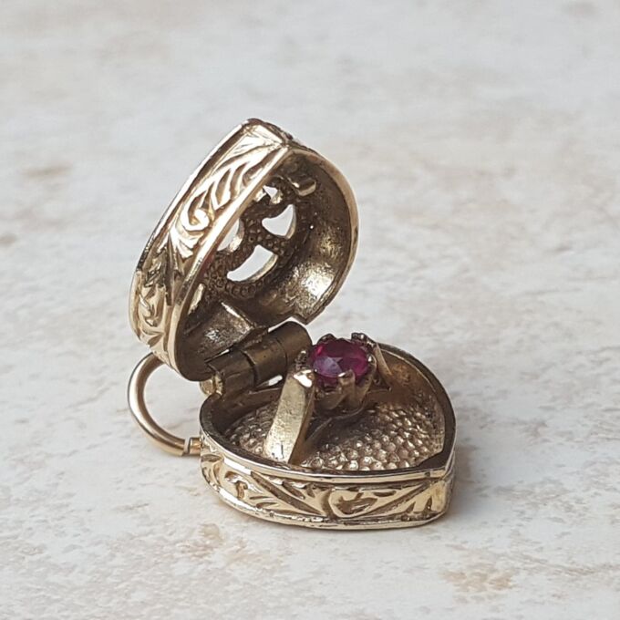 Truly Fabulous Heart Locket Secret Ruby Ring in 9ct Gold