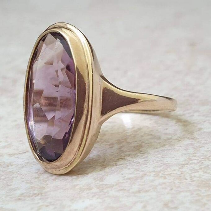 Elongated Oval Amethyst Solitaire Ring in 9ct gold.