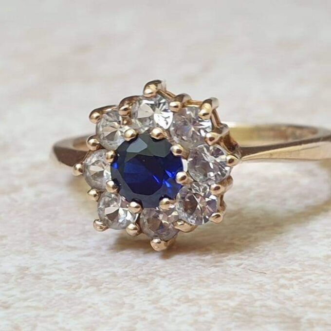 Synthetic Sapphire and Spinel Daisy Ring in 9ct gold, a UK M 1/2 or a ...