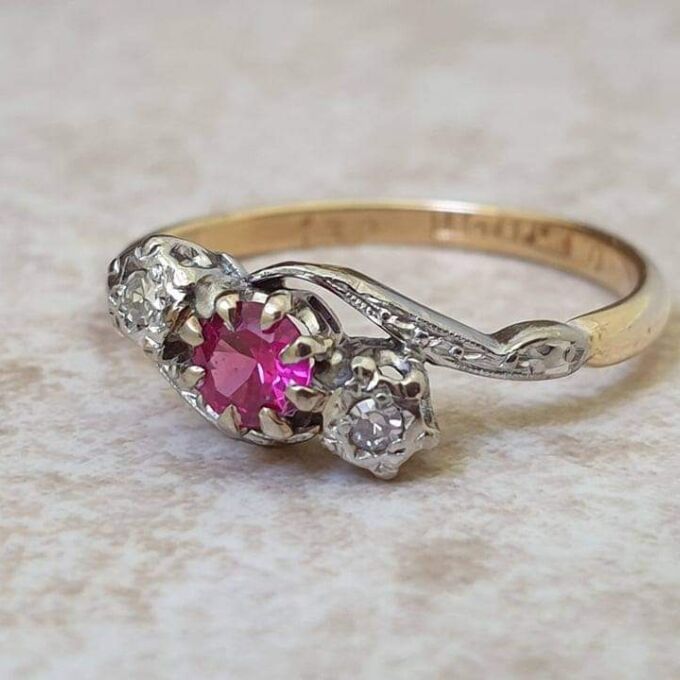 Ruby & Diamond Crossover Ring in 18ct Gold and Platinum.