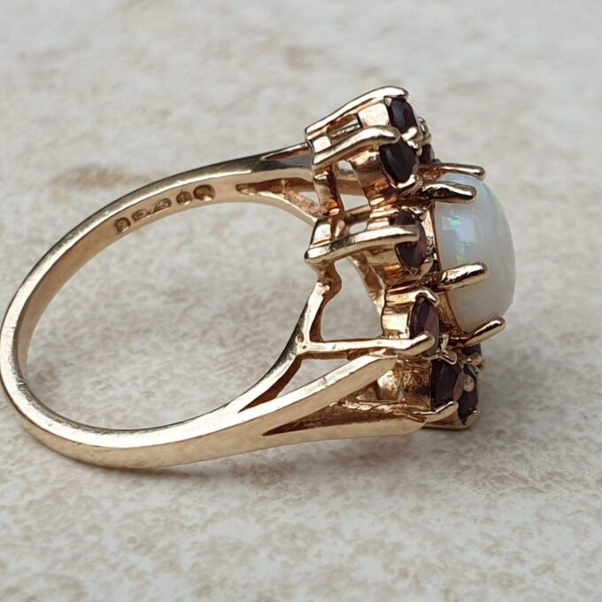 Opal and Garnet Halo Cluster Ring in 9ct Gold.