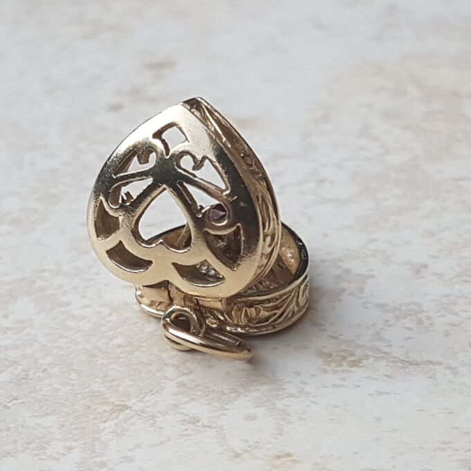 Truly Fabulous Heart Locket Secret Ruby Ring in 9ct Gold