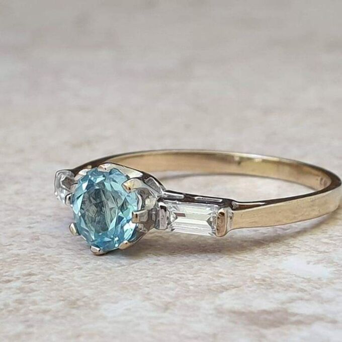 Topaz and Ring in 9ct Gold,  a UK O or a US 7 1/2