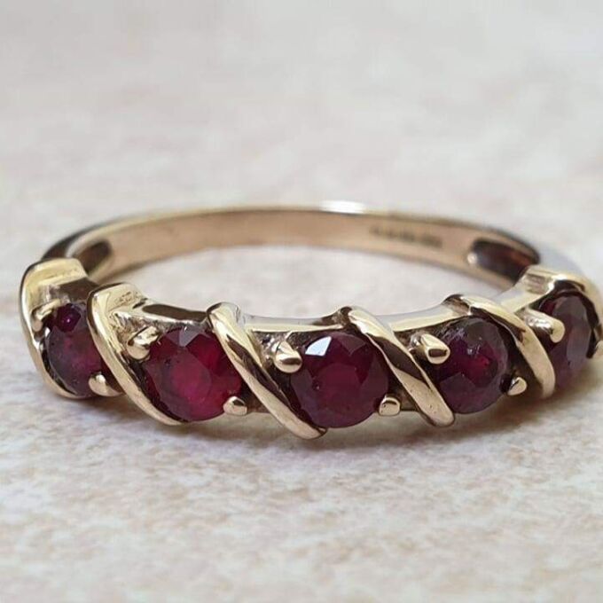 Five Stone Ruby Ring in 9ct Gold.