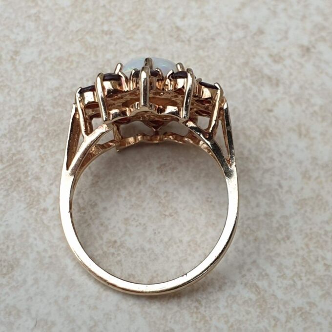 Opal and Garnet Halo Cluster Ring in 9ct Gold.