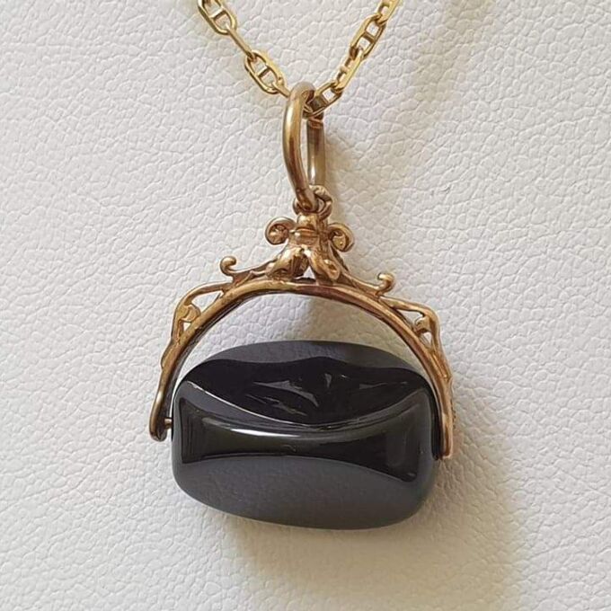 Onyx Spinner Fob Pendant in 9ct Gold.