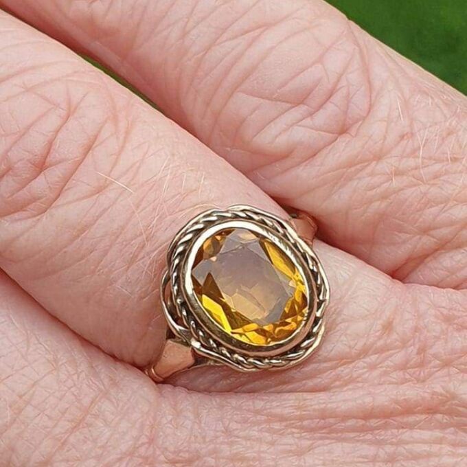 Vibrant Synthetic Yellow Sapphire in 9ct Gold, a UK N or a US 7