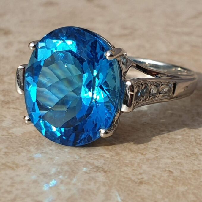 Swiss Blue Topaz Solitaire Ring in 9ct White Gold,  a UK N 1/2 or a US 7 1/4.