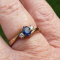 Sapphire and Diamond Trilogy Bypass Ring in 9ct Gold, a UK I 1/2 or a US 4 3/4.