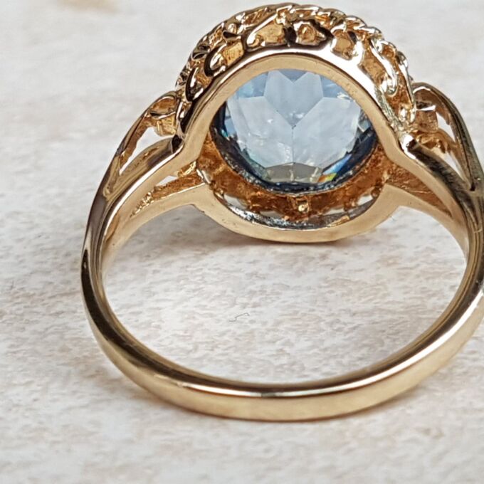 Pretty Synthetic Blue Spinel Solitaire Ring in 9ct Gold, a UK O or a US 7 1/4.