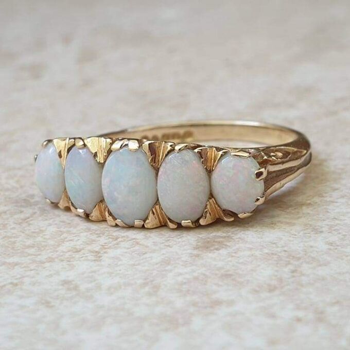 Graduating Five Stone Opal Ring in 9ct Gold, a UK O or a US 7 1/4