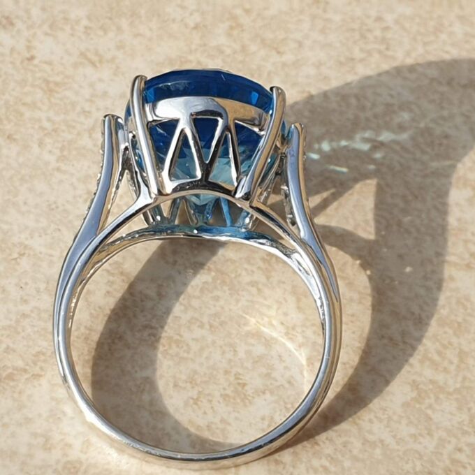 Swiss Blue Topaz Solitaire Ring in 9ct White Gold,  a UK N 1/2 or a US 7 1/4.