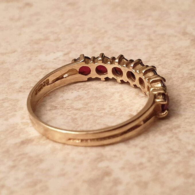 Seven Stone Garnet Band in 9ct Gold, a UK L 1/2 or a US 6