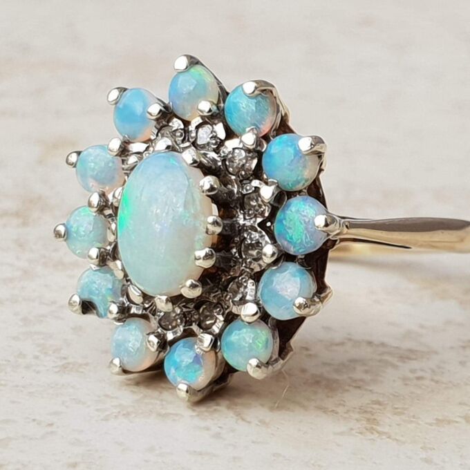 Opal and Diamond Halo Cluster Ring in 9ct Gold, a UK M or a US 6 1/2.