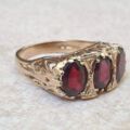 Three Stone Garnet Ring in 9ct Gold.