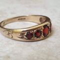 Six Stone Graduating Garnet Band Ring in 9ct Gold, a UK S or a US 9 1/4