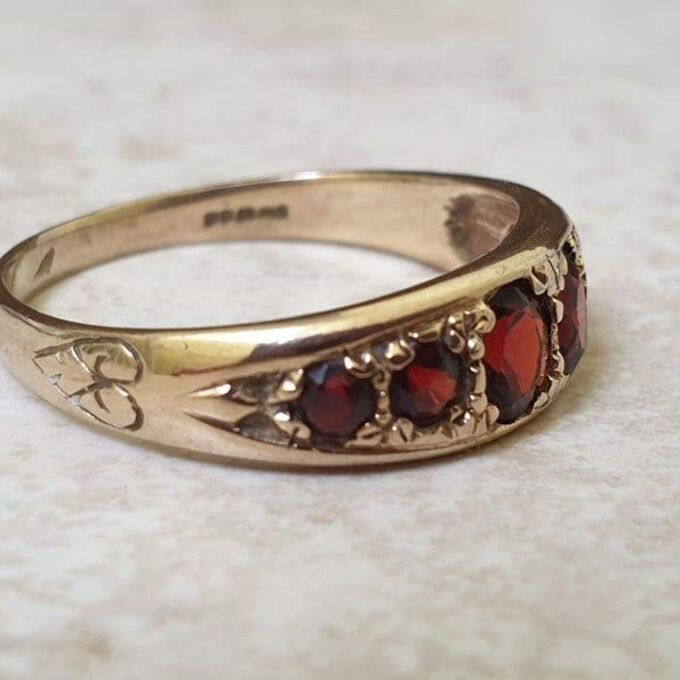 Six Stone Graduating Garnet Band Ring in 9ct Gold, a UK S or a US 9 1/4