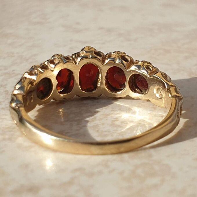 Graduating Five Stone Garnet Ring in 9ct Gold,  a UK N 1/2 or a US almost 7 1/4.
