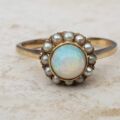 Stunning Opal and Split Pearl Halo Ring in 9ct Gold, a UK L 1/2 or a US 6 1/4.
