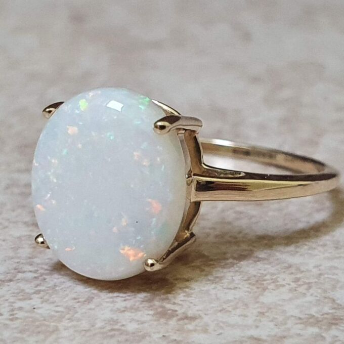 Simple Opal Solitaire Ring in 9ct Gold.