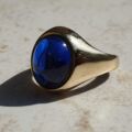 Synthetic Sapphire Cabochon Signet Ring in 9ct Gold, a UK P 1/2 or a US 8.
