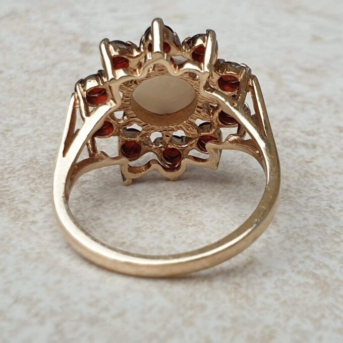 Opal and Garnet Halo Cluster Ring in 9ct Gold.