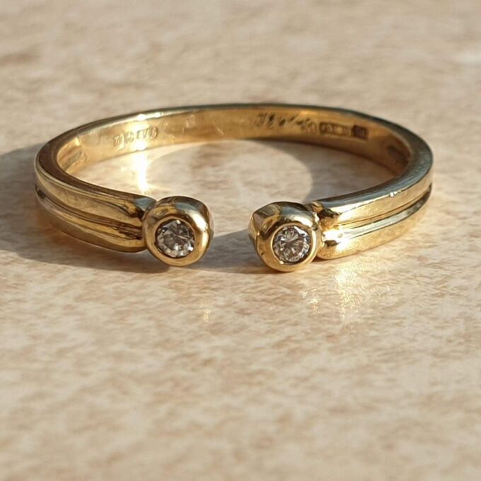 Diamond Set Torque Ring in 9ct Gold,  a UK M 1/2 or a US 6 3/4.
