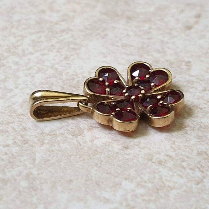 Garnet Four Leaf Clover Pendant in 9ct Gold