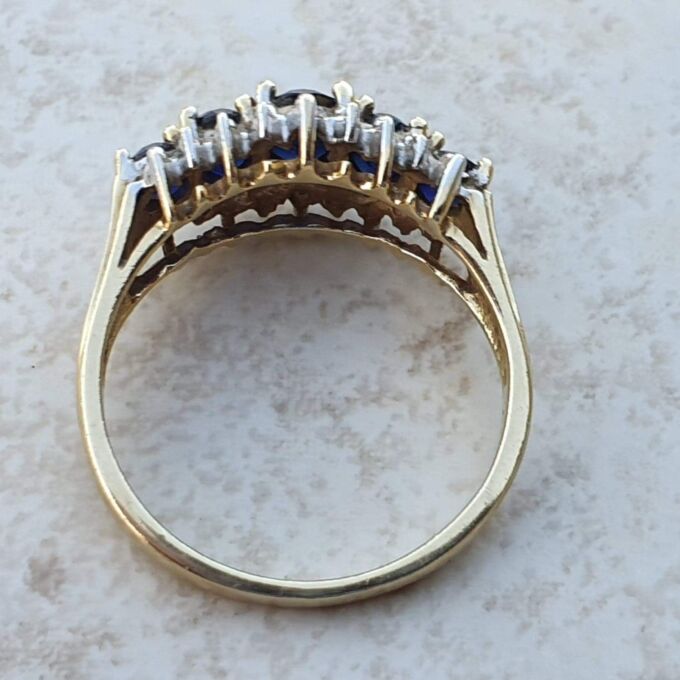 Graduating Synthetic Sapphire Five Stone Ring in 10k Gold.