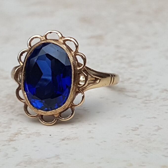 Synthetic Sapphire Solitaire Ring in 9ct Gold, a UK K or a US 5 3/4.