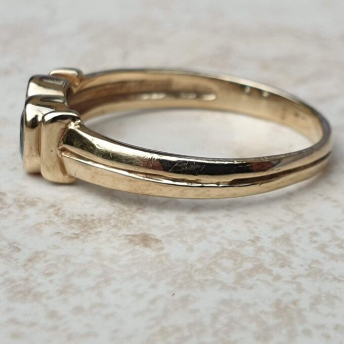 Torque Style Topaz Ring in 9ct Gold,  a UK M or a US 6 1/2.