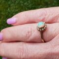 Stunning Opal and Split Pearl Halo Ring in 9ct Gold, a UK L 1/2 or a US 6 1/4.