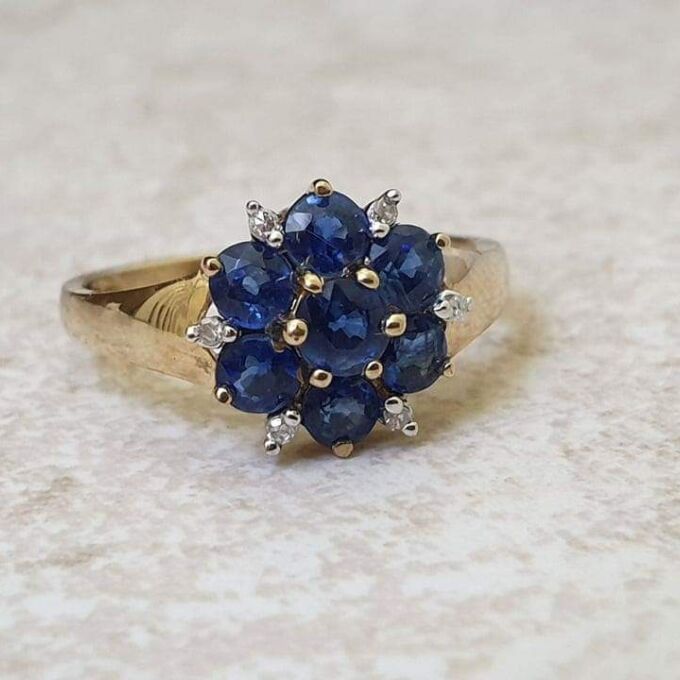Tanzanite And Diamond Cluster Ring in 9ct Gold,  a UK J 1/2 or a US 5 1/4.