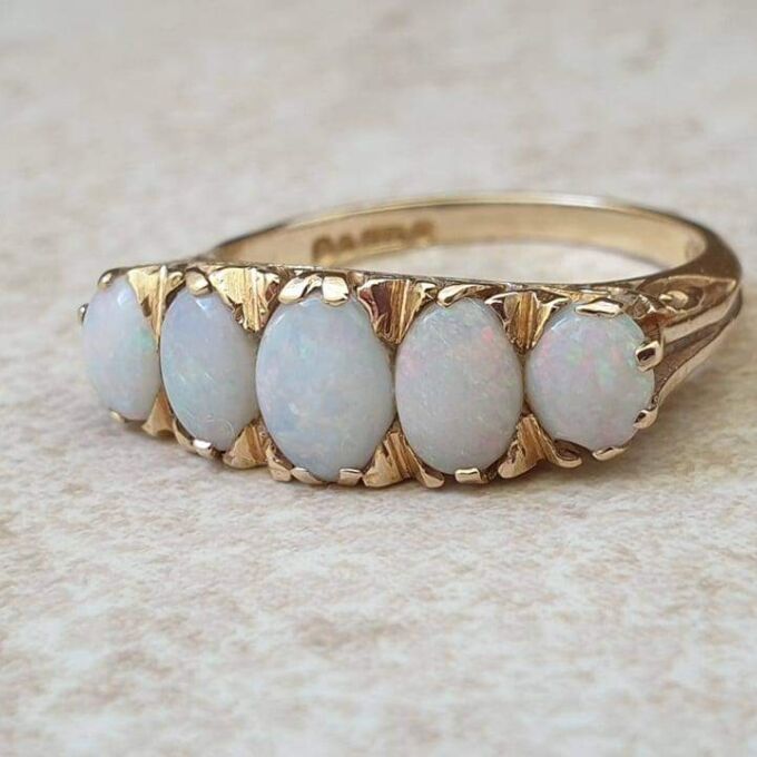 Graduating Five Stone Opal Ring in 9ct Gold, a UK O or a US 7 1/4