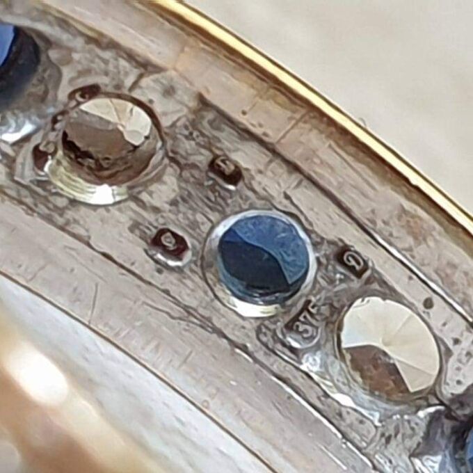 Synthetic Spinel Full Eternity Ring in 9ct Gold.