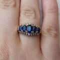 Graduating Synthetic Sapphire Five Stone Ring in 10k Gold.