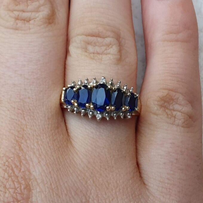 Graduating Synthetic Sapphire Five Stone Ring in 10k Gold.