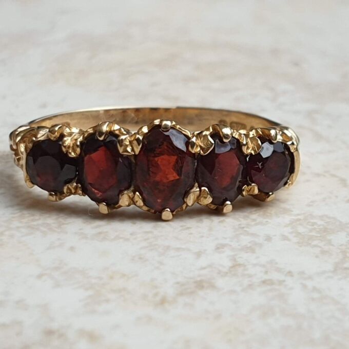 Five Stone Graduating Ring in 9ct Gold,  a UK R or a US 9.