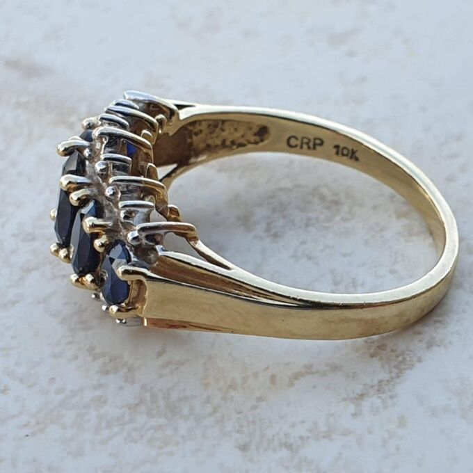 Graduating Synthetic Sapphire Five Stone Ring in 10k Gold.