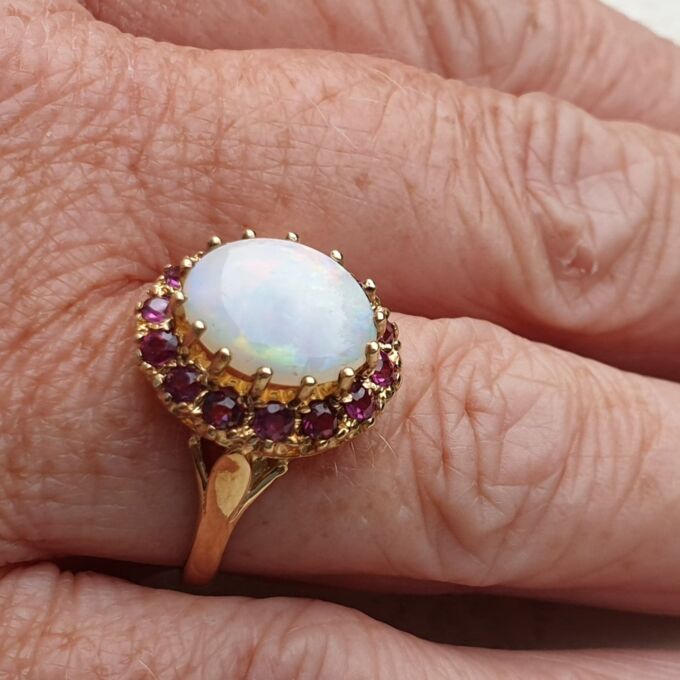 Opal & Ruby Ring in 9ct Gold, a UK O or a US 7 1/2