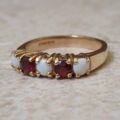 Opal and Garnet Ring in 9ct Gold, a UK J or a US 5