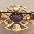 Celtic Style Amethyst Brooch in 9ct Gold.