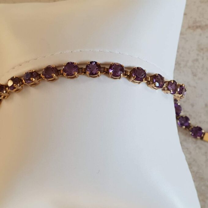 Amethyst Tennis Bracelet in 9ct Gold,  7 1/4 inches in length.