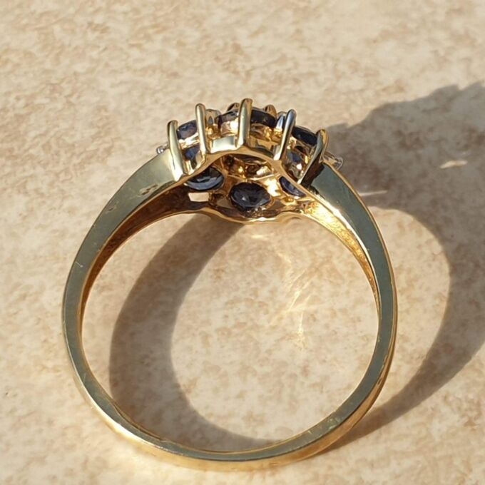 Tanzanite And Diamond Cluster Ring in 9ct Gold,  a UK J 1/2 or a US 5 1/4.