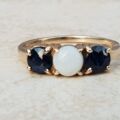 Opal and Sapphire Trilogy Ring in 9ct Gold, a UK J 1/2 or a US 5 1/4.