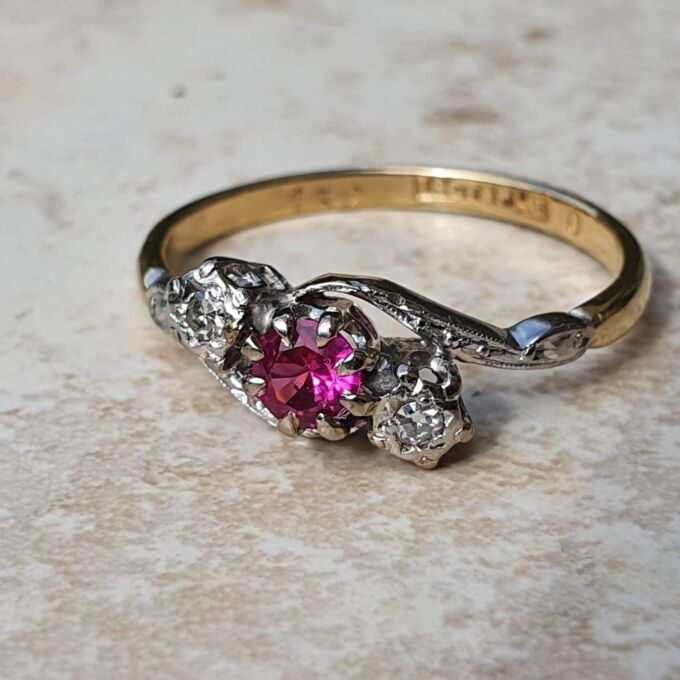 Ruby & Diamond Crossover Ring in 18ct Gold and Platinum.