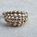 Bombe Ring in 9ct Gold, a UK O or a US 7 1/2