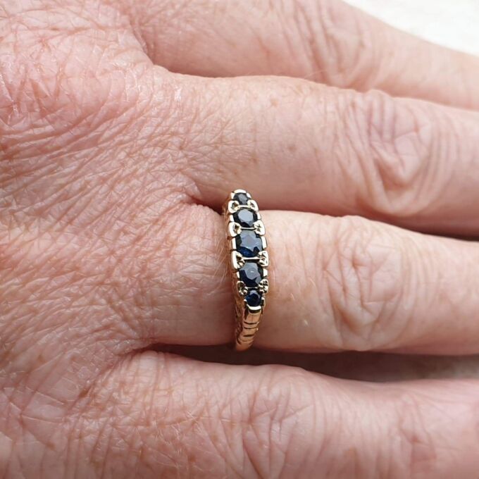 Blue Sapphire Five Stone Ring in 9ct Yellow Gold, a UK K 1/2 or a US 5 3/4.