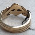 Four Piece Puzzle Ring in 9ct Gold, a UK N 1/2 or a US 7 1/2