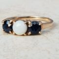 Opal and Sapphire Trilogy Ring in 9ct Gold, a UK J 1/2 or a US 5 1/4.
